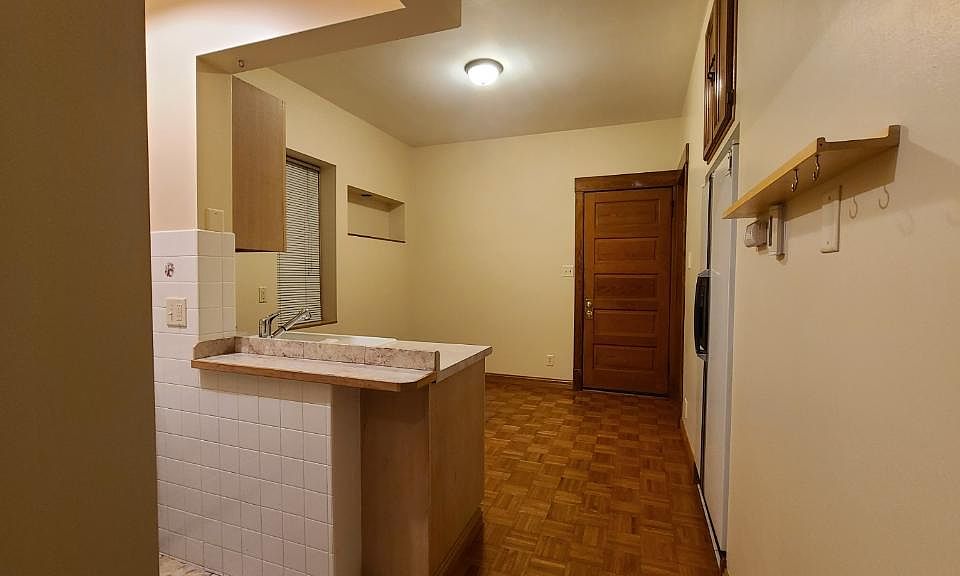 Large kitchen, open floor plan and hardwood floors