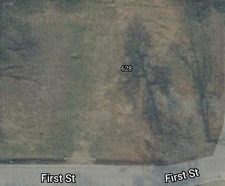 Aerial view of corner lot.