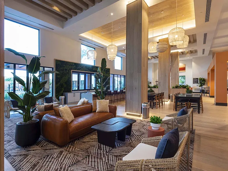 Unwind and socialize in style at our vibrant clubroom, designed for relaxation and connection.