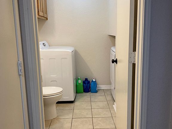 1/2 bath with washer/dryer connections (W/D not included).