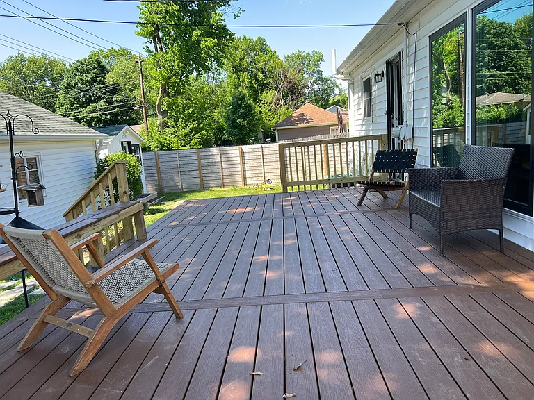 Huge back deck with ample shade, perfect for gatherings with family and friends.