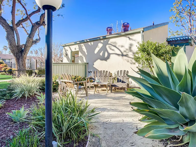 Outdoor Chairs next to Laundry Room