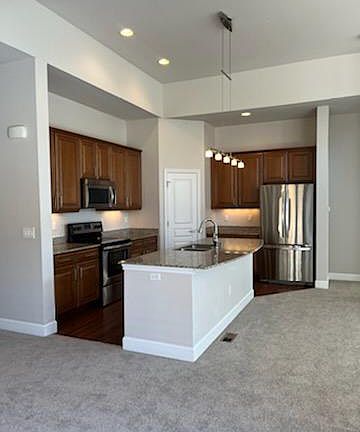 stainless appliances, granite countertops, under counter lighting, upgraded cabinets, large pantry