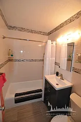 Sold by Manhattan Realty Group