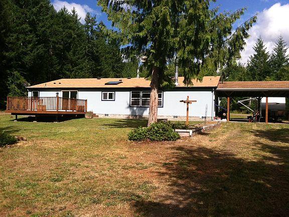 rear of house deck and carport