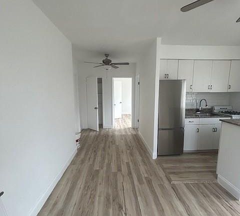 Entrance Foyer and panty - beautiful stainless steel refrigerator