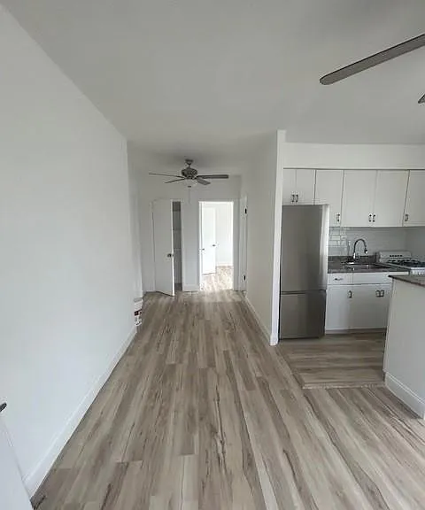 Entrance Foyer and panty - beautiful stainless steel refrigerator