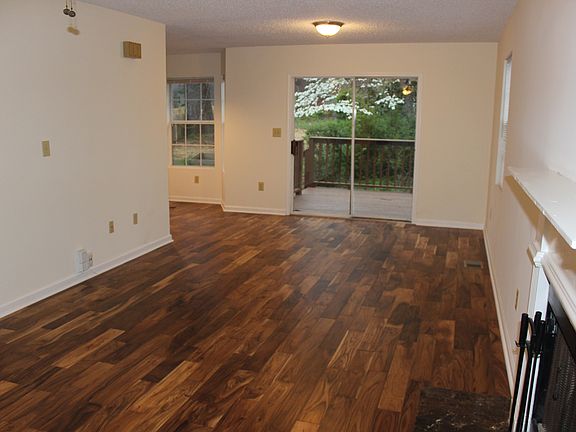 Living room with view of back deck.