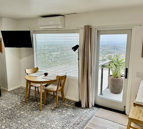 Blinds and blackout curtain ensure a good sleep no matter the time of day, while the retractable screen and AC/heat pump provide comfortable temps