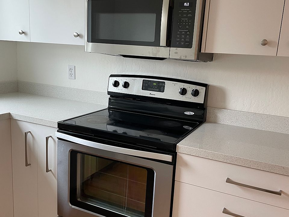 microwave and solid surface electric stove