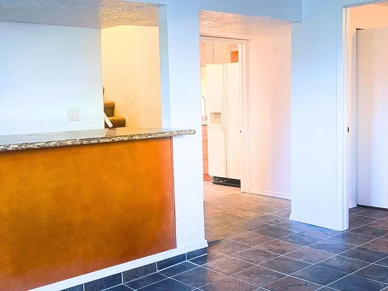 Downstairs built-in bar with storage