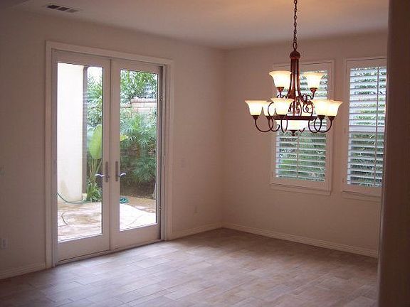 Formal dining room - double french doors to waterfall