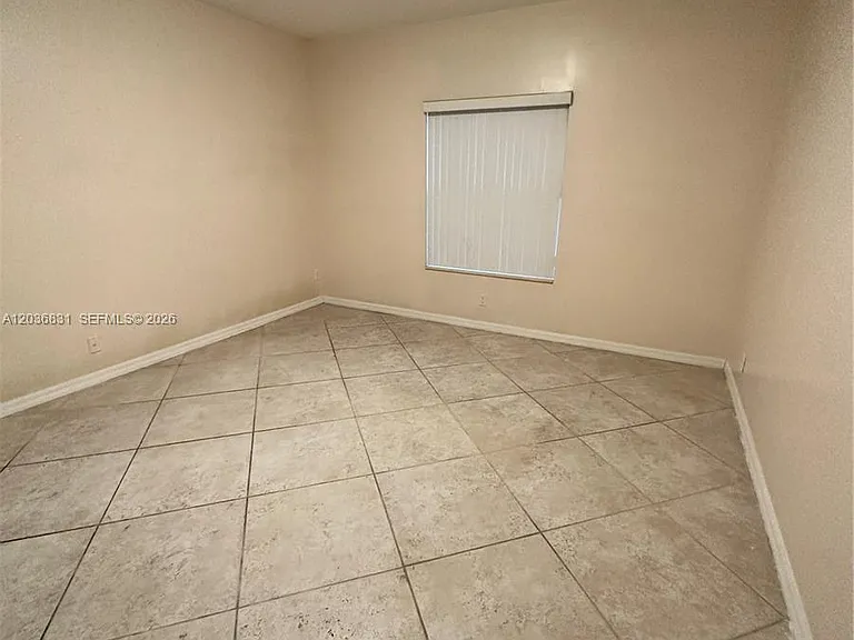 2988 NW 7th Ct — Photo 11