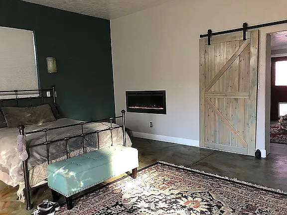 Huge Master suite with wall fireplace