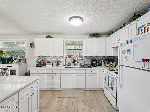 4th image of 5822 TROUT RIVER Boulevard