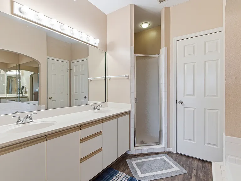 Master bathroom with 2 person jacuzzi tub and walk-in shower and double vanity