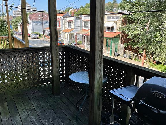 A view of the deck area off of the living room