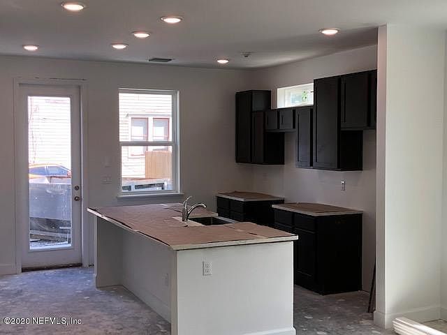 2nd image of 105 E 6th St