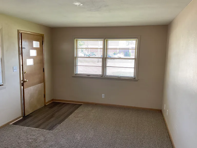 Living Room, with lots of windows and ALL NEW flooring!