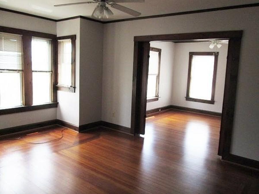 Option for double living room or 3rd bedroom in front.