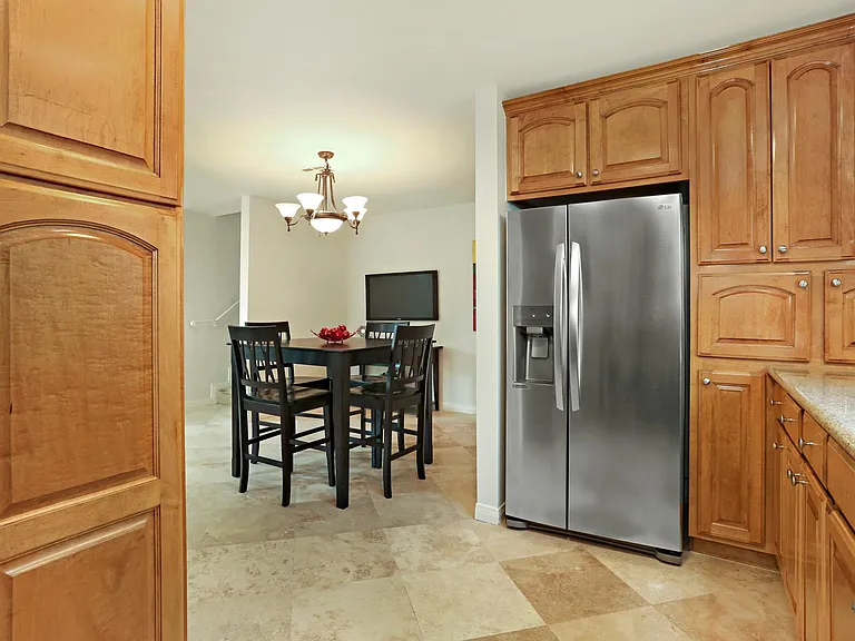 Kitchen with Cheery wood cabinetry