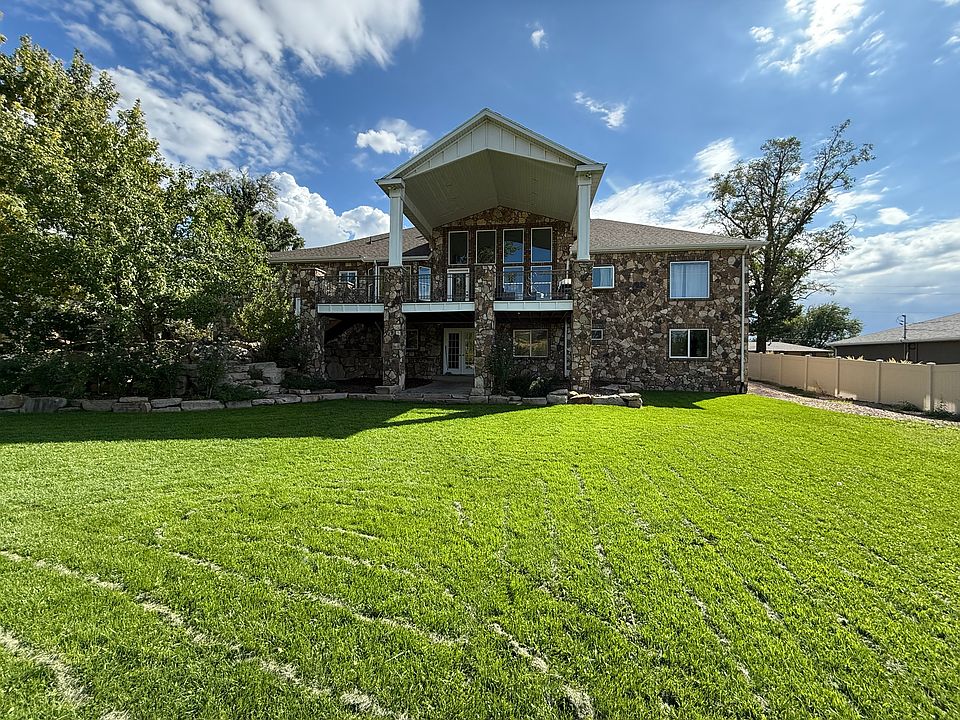 Back yard to main entrance.