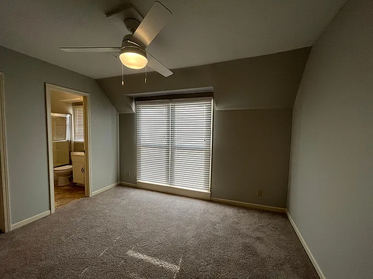 View of 2nd Bedroom with a glimpse of the private bathroom it offers