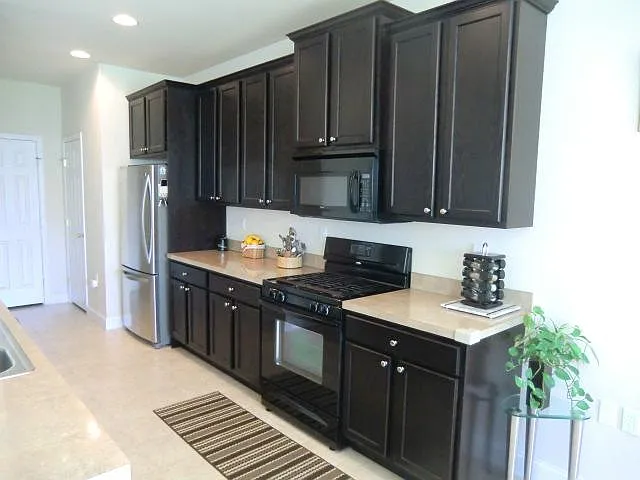 Kitchen cabinets with New appliances (New Gas Stove, dishwas