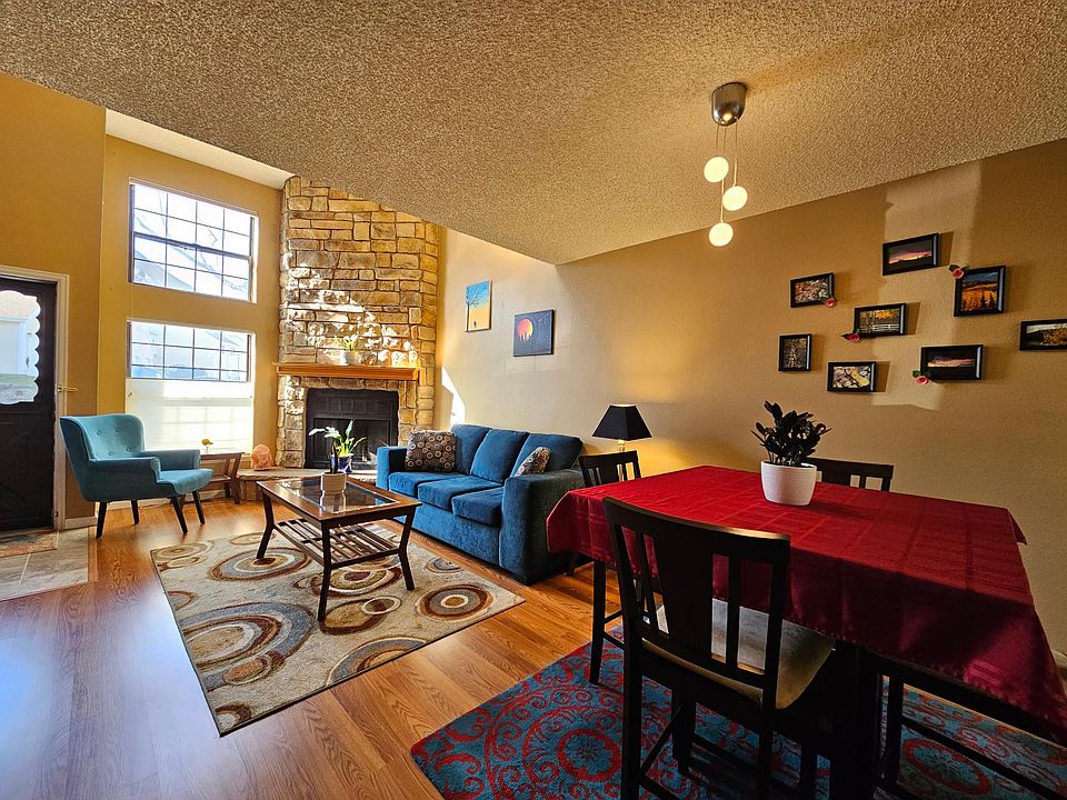 South facing double high windows and skylight brings in an abundance of sunlight. A wood burning fireplace with intricate stone work floor to ceiling.