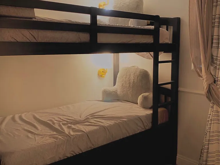 Very large closet in second bedroom. Depending on need can be used as seen pictured here: triple bunk with slide out bed. This room also has a built-in Murfey Bed for guests to maximize play or office space.