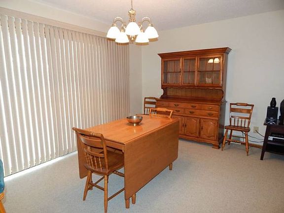 Dining room with sliding glass door.