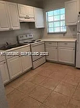 700 NW 19th Ter — Photo 3