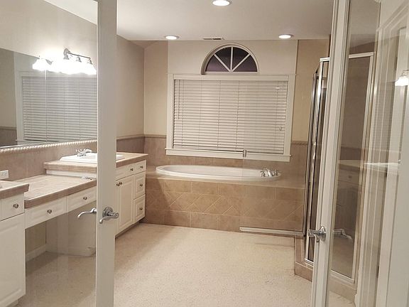Extra large Master Bath with his and hers sink and cabinet