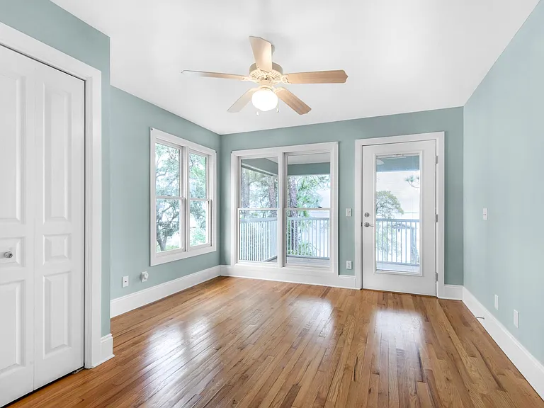 Upstairs bedroom connecting to bath with private vanity area