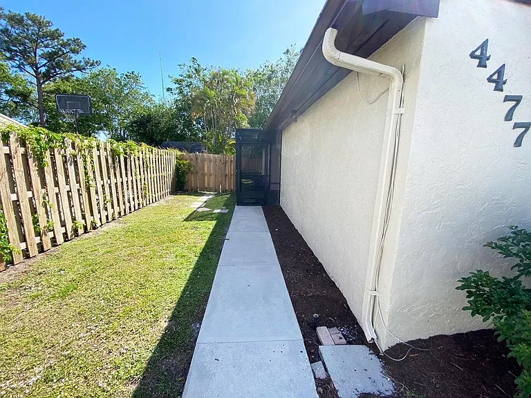 4477 NW 3rd Dr — Photo 9