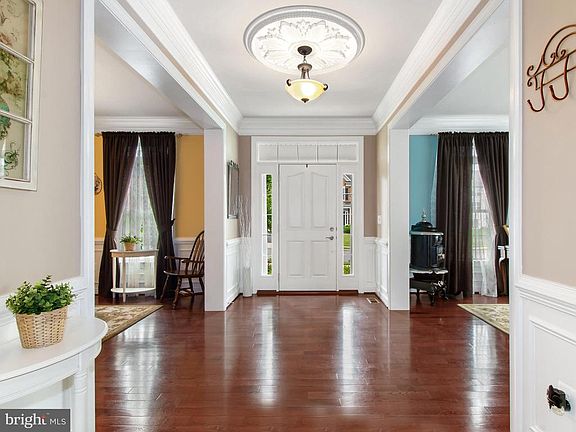 Foyer with Gleaming Hardwoods