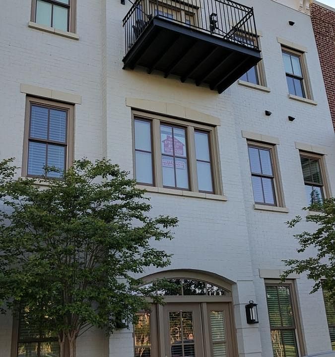 Windows overlooking the park area.