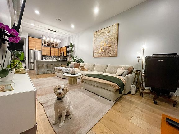 11 foot ceilings, new light fixtures and Phillips color-changing Hue lighting throughout the unit.