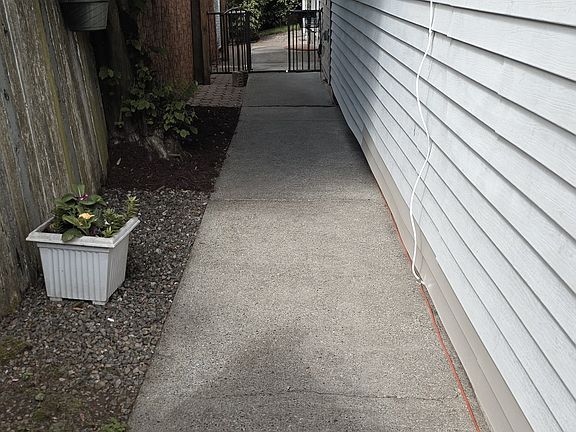 South walkway to the front door of the mother-in-law house.