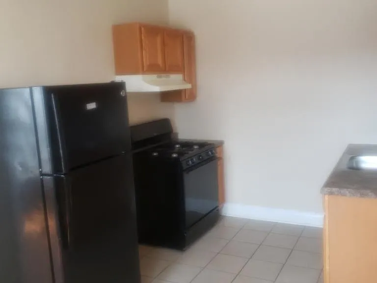 7852 S Eberhart Ave #202 — Photo 4
