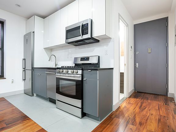 2nd image of 130 E 59th St APT 1C