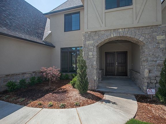 Lovely landscaping and huge lot