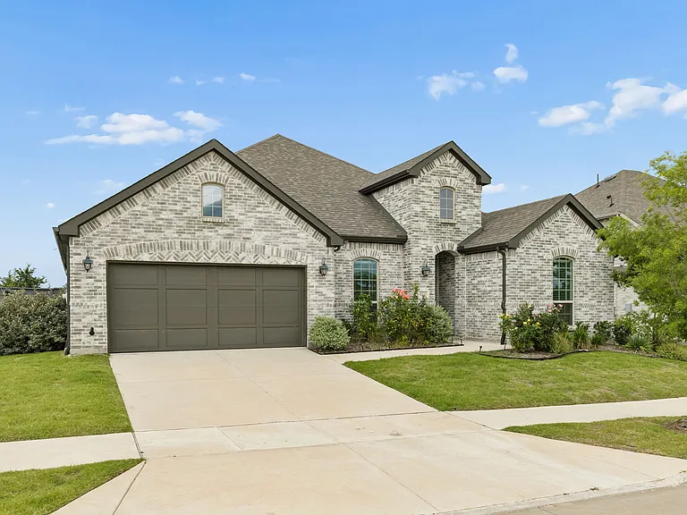 On a perfect lot backing to trees and green space and fronting the gorgeous Central Park of Union Park, this location is prime!