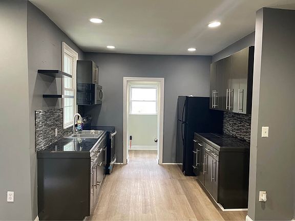 fully equipped with a stove, refrigerator and microwave.