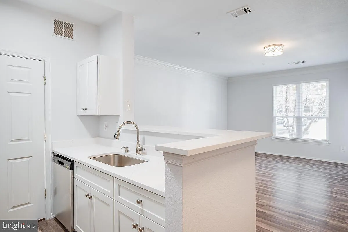 1571 Spring Gate Dr — Photo 3