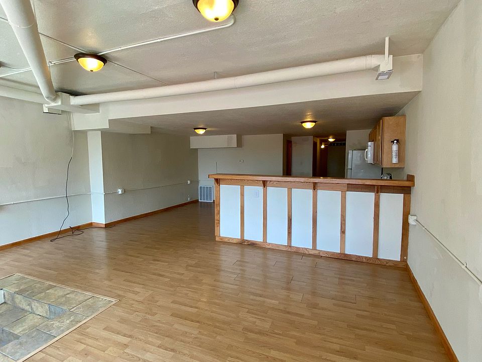 Living room looking toward kitchen area