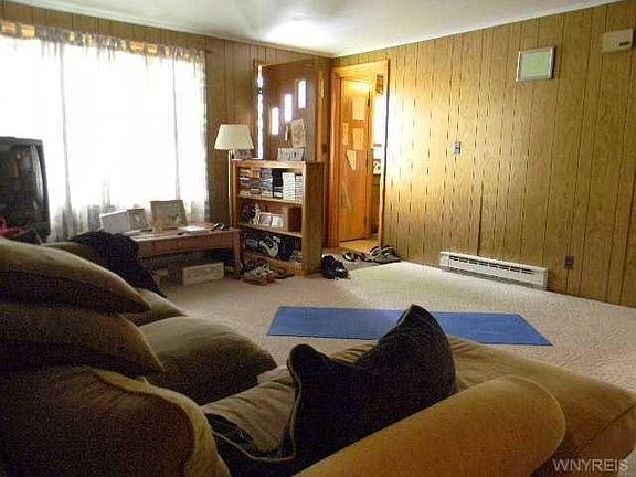 living room with built in book case
