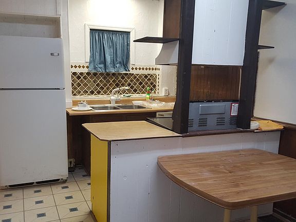 Kitchen area, near bathroom, patio- exit door