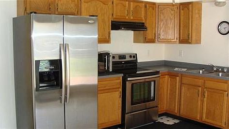 kitchen with appliance (refrigerator & range)