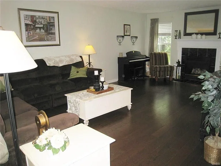 Welcome to your new home! The front door opens to a vaulted ceiling and stairwell. This spacious living room is immediately to the left as you walk in. Enjoy the gas fire place with the flip of a switch!